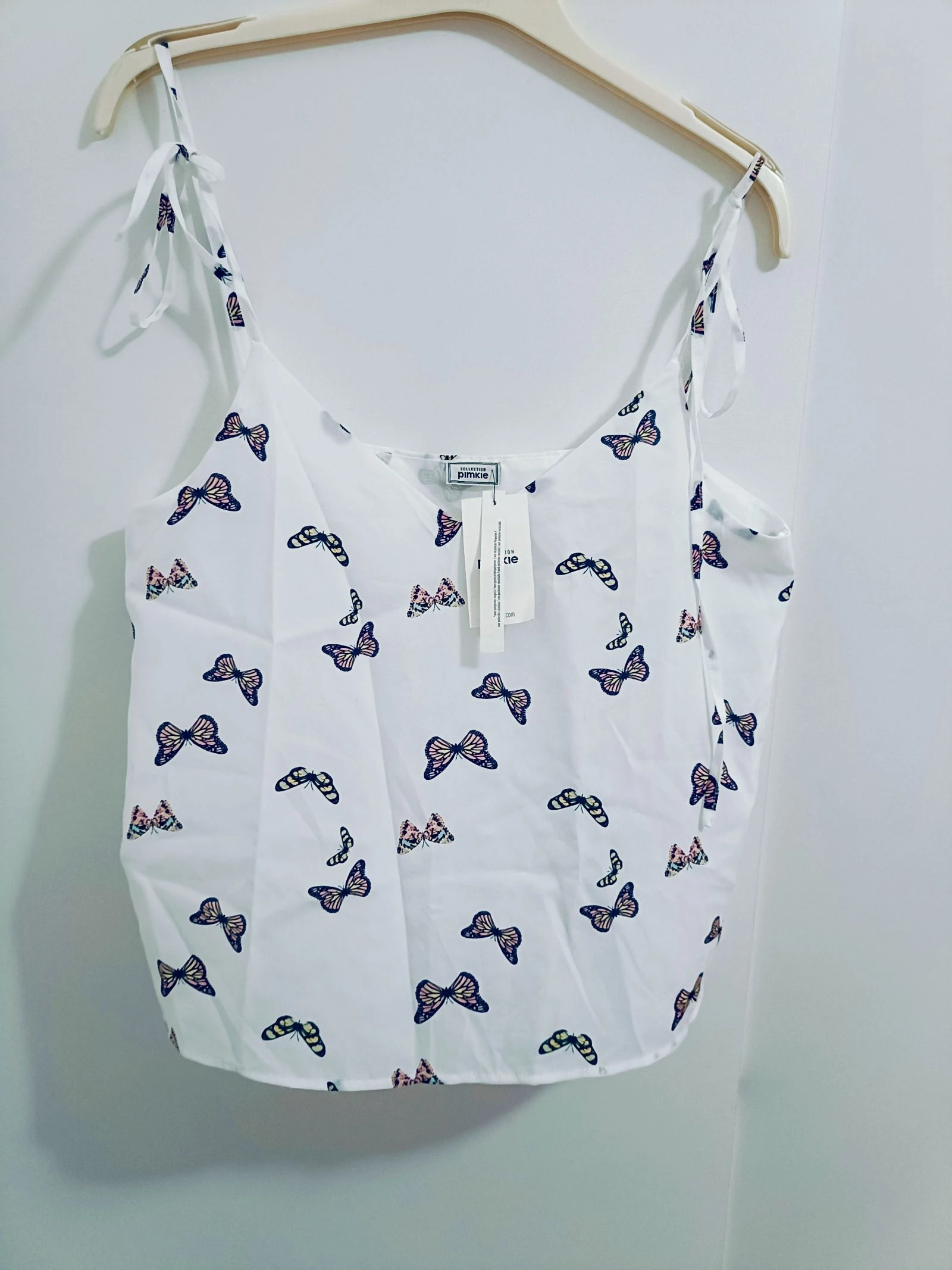 Blusa blanca mariposas